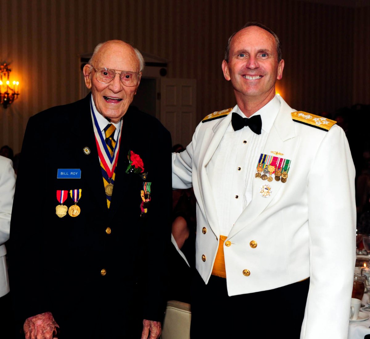 WASHINGTON (Sept. 19, 2007) - A Sailor shows off the prototype uniform for  service dress khaki, a throwback to the traditional WWII style uniform. It  allows for chiefs and officers to shift