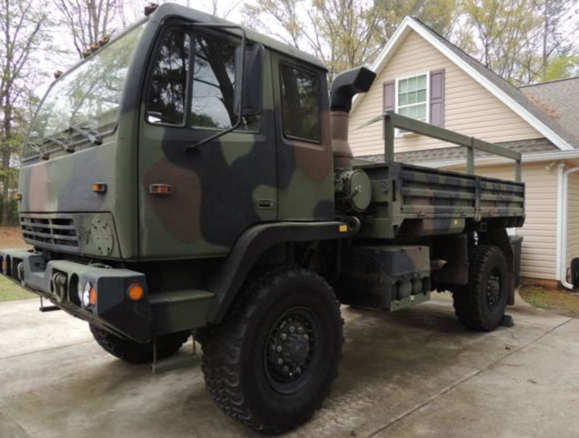 Stevenson M1079 LMTV 4x4 in a driveway.